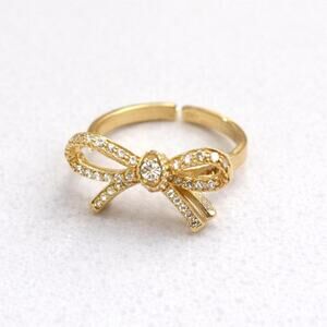 Gold bow ring adjustable does